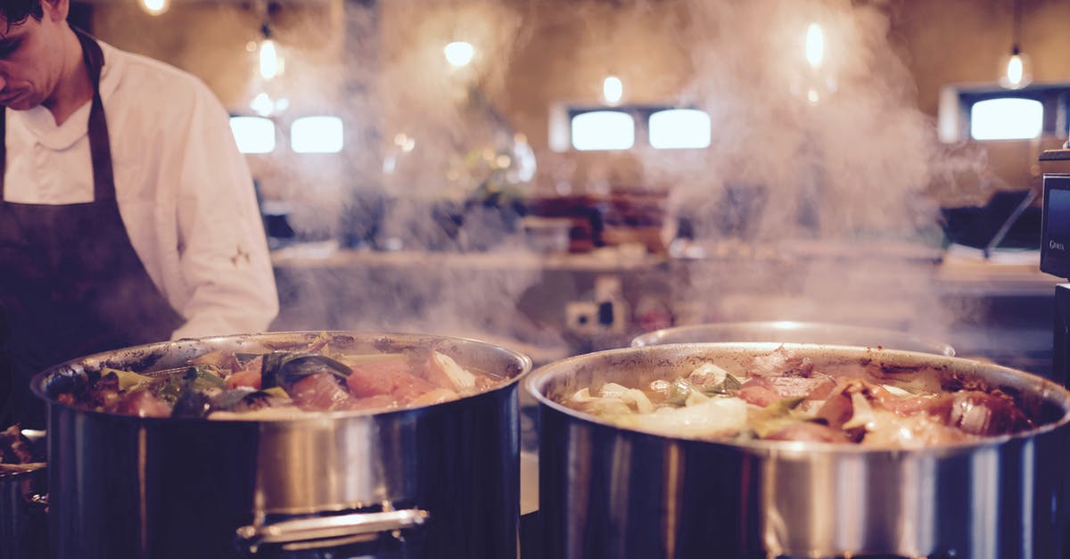 Chicken stock in slow cooker - danger zone? - Man Wearing Black Apron Near Two Silver Metal Cooking Pot