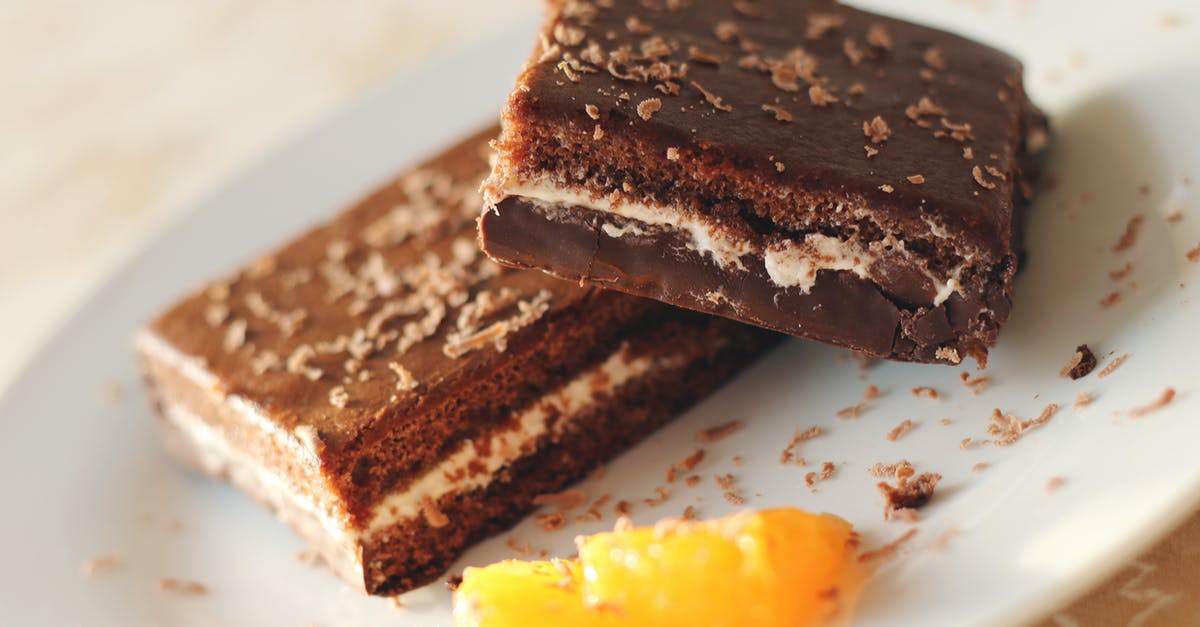 Chocolate cake vs Brownies - Baked Brownies on Plate