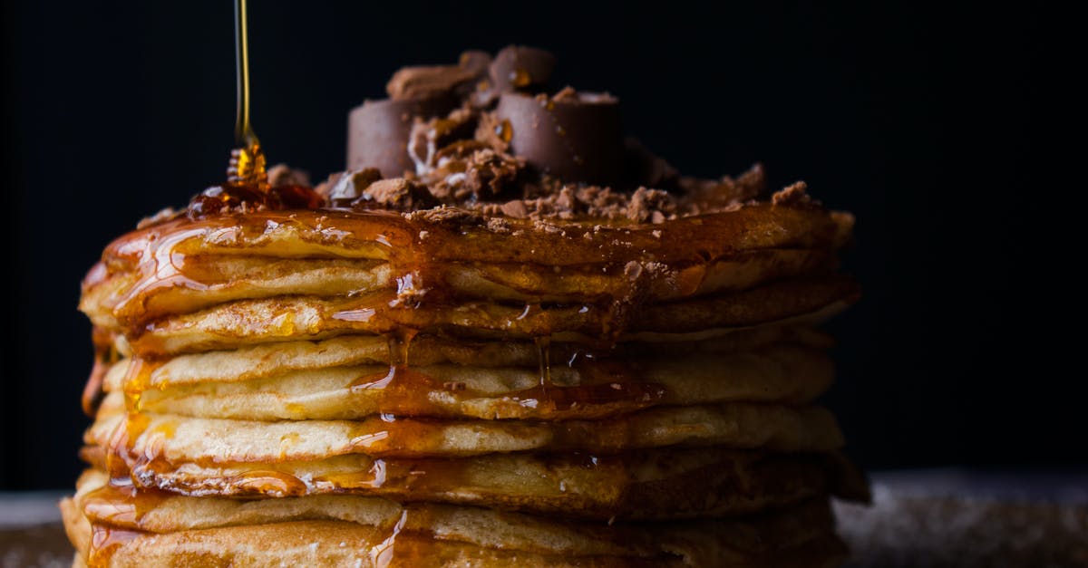 Chocolate pancakes using melted chocolate - Pile of Pancake With Honey