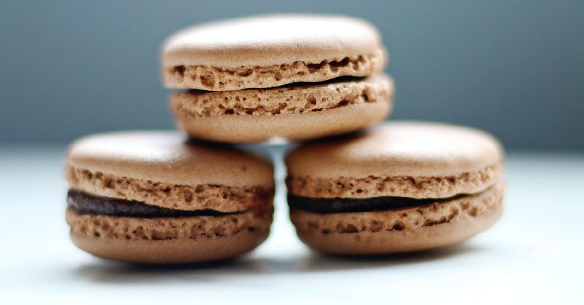 Chocolate won’t harden up on my cookies - Selective Focus Photo of Three Macaroons