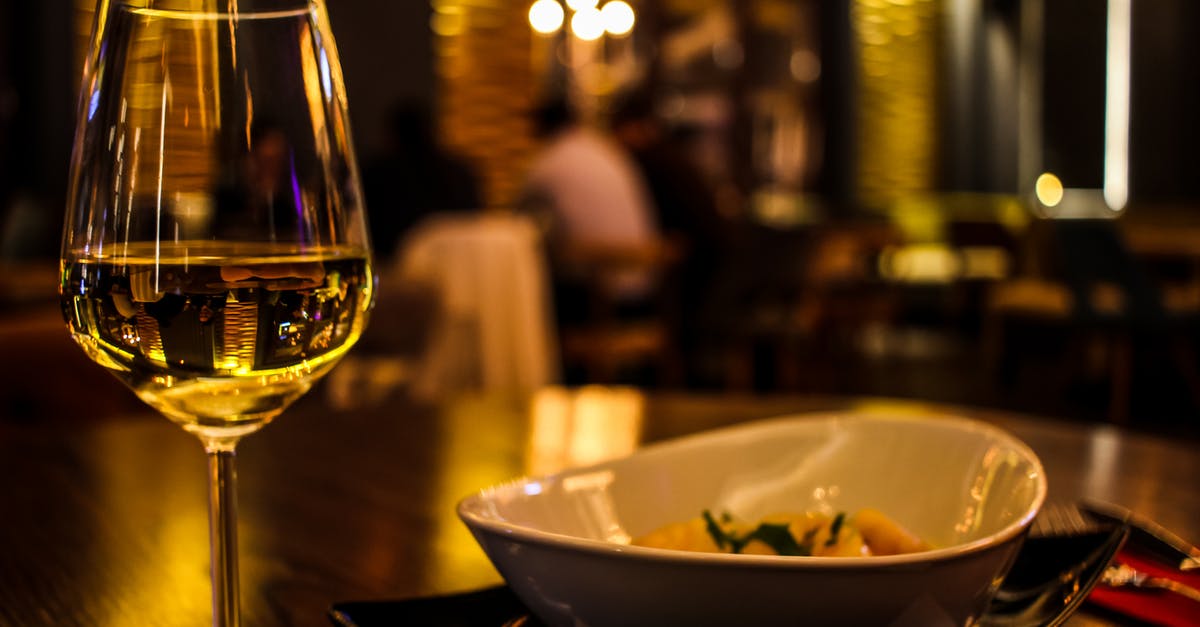 Choosing a wine that complements a meal [closed] - Clear Footed Glass Beside Bowl