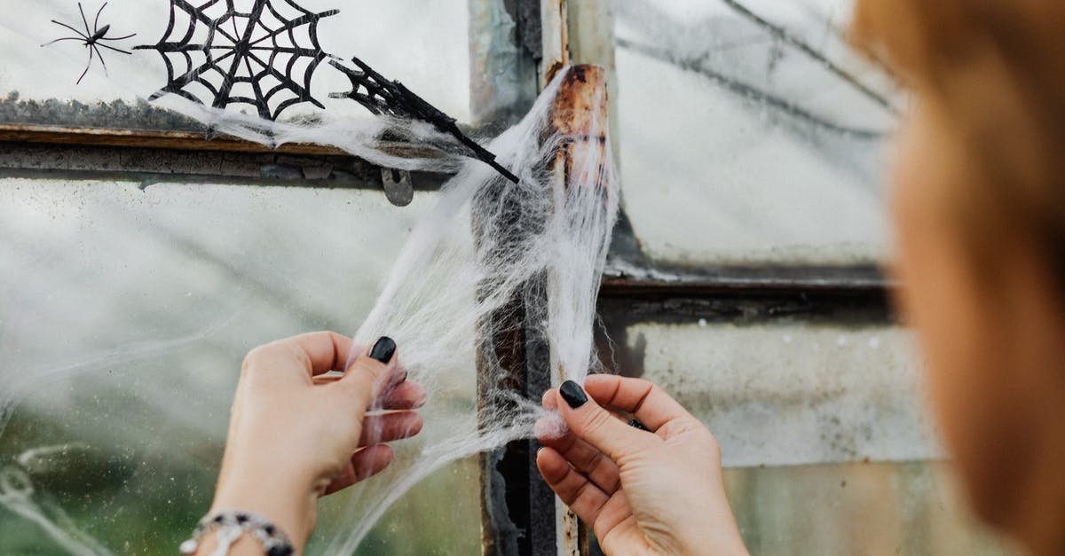 Cleaning burnt-on grease with ammonia - Person Holding White Powder in Front of Window