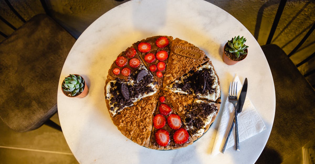 Coating fruit before adding to a cake - Round Cake with Slices of Strawberry 