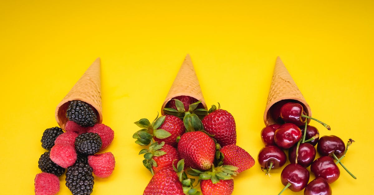 Coating to make waffle cones withstand hot liquid? - Strawberries and Brown Cone on Yellow Surface