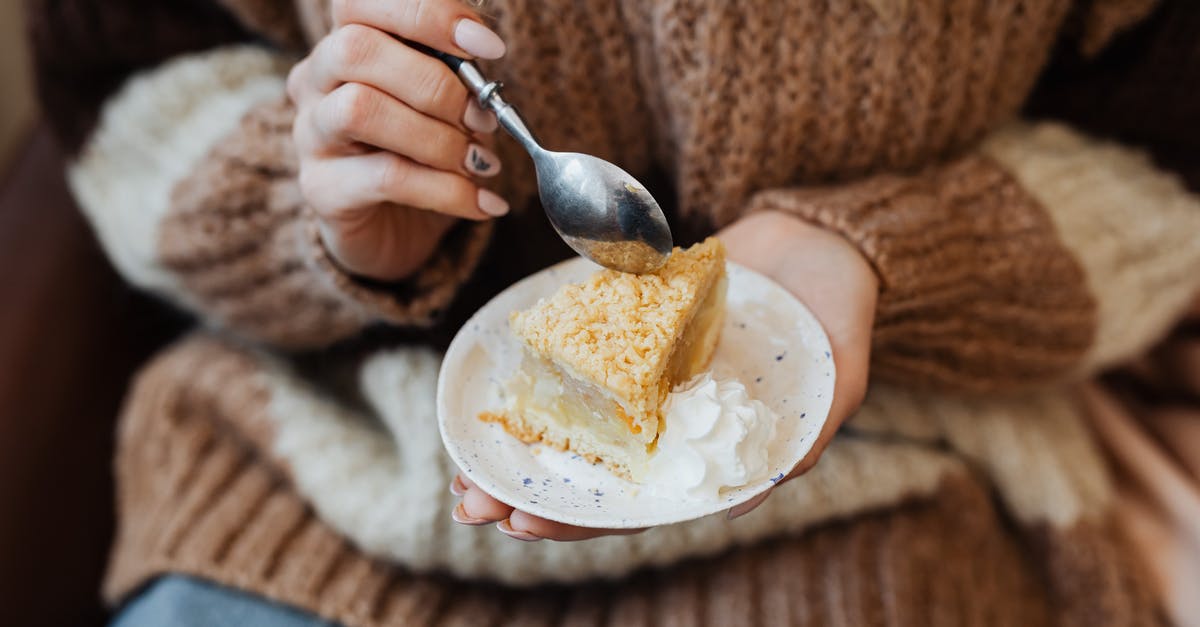 Cobbler vs pie? - Person Holding Stainless Steel Spoon