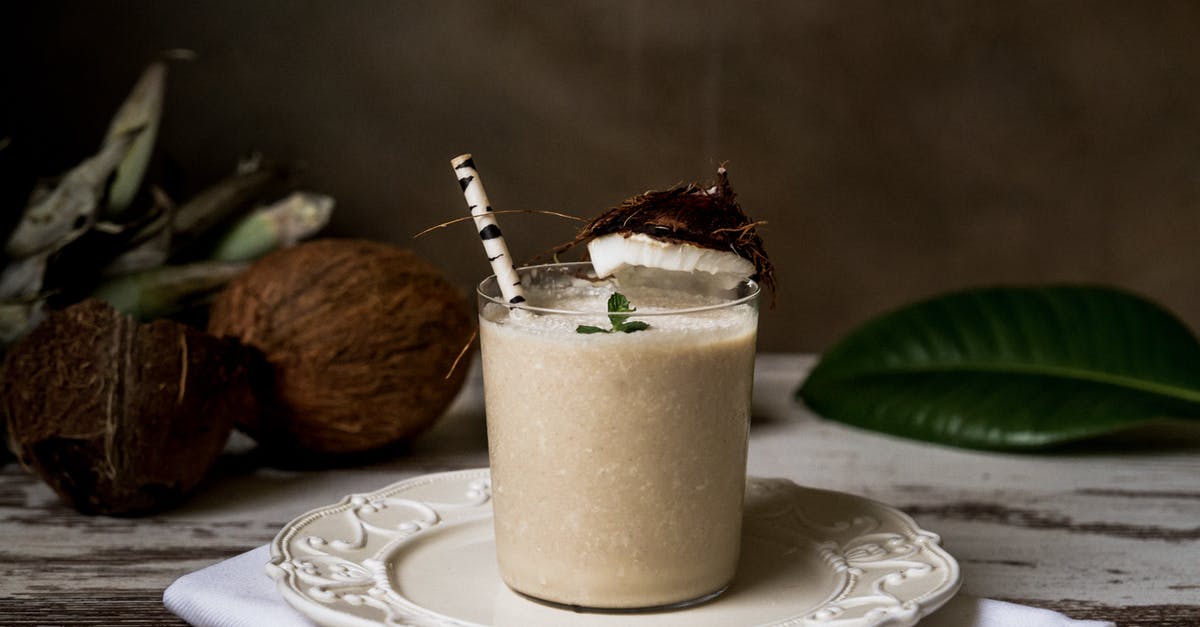 Coconut cream from coconut butter - Clear Drinking Glass Filled With Beverage