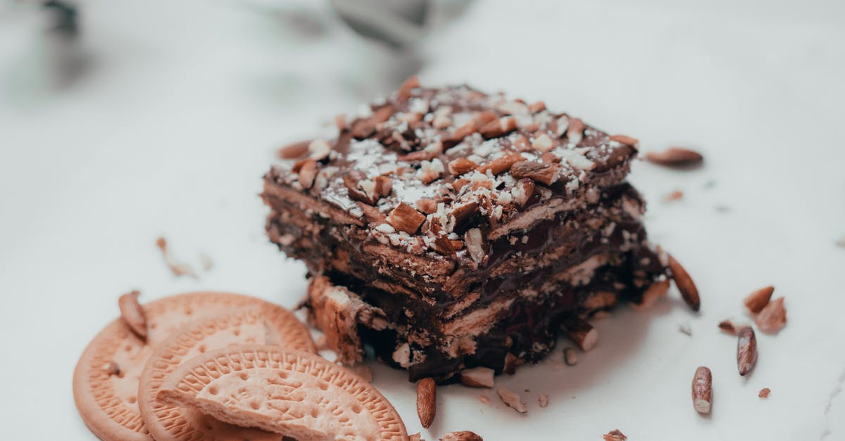 Coconut sugar flavor - Chocolate cake with nuts served with biscuits