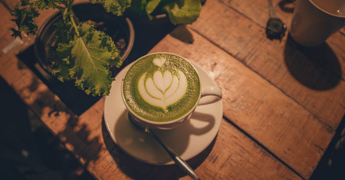 Coffee foam vs. Tea foam - White Ceramic Cup Near Plant