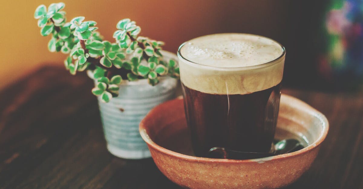 Coffee foam vs. Tea foam - Photograph of a Glass of Drink