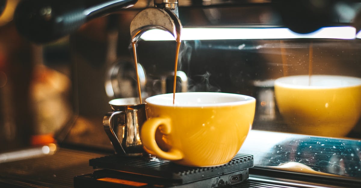 Cold-brewing coffee - Espresso Machine Dispensing on Two Mugs