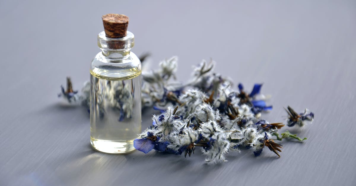 Colouring oil - chocolate look alike - Selective Focus Photo of Bottle With Cork Lid