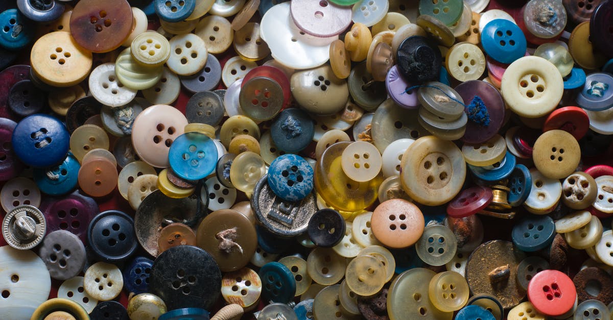 Combining whetstones from different manufacturers - Pile of different multicolored clothing buttons