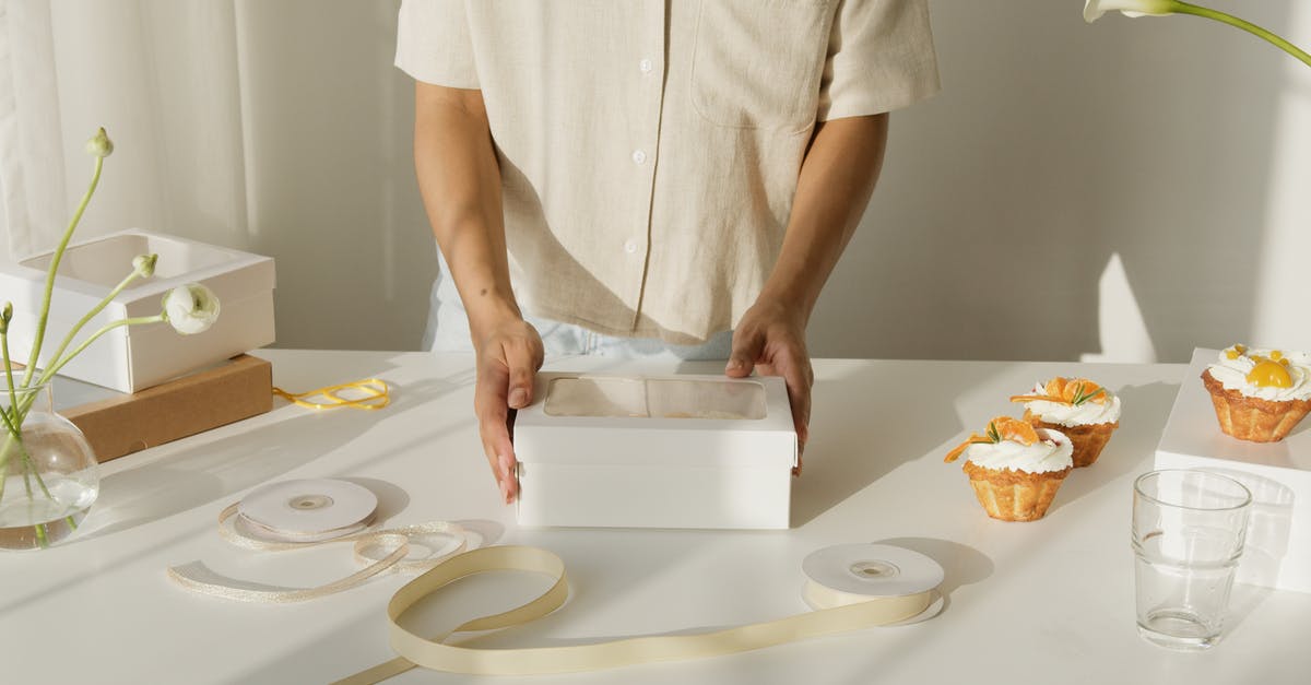 Commercial Bakery to Provide Dough - Person in White Button Up Shirt Holding White Plastic Container