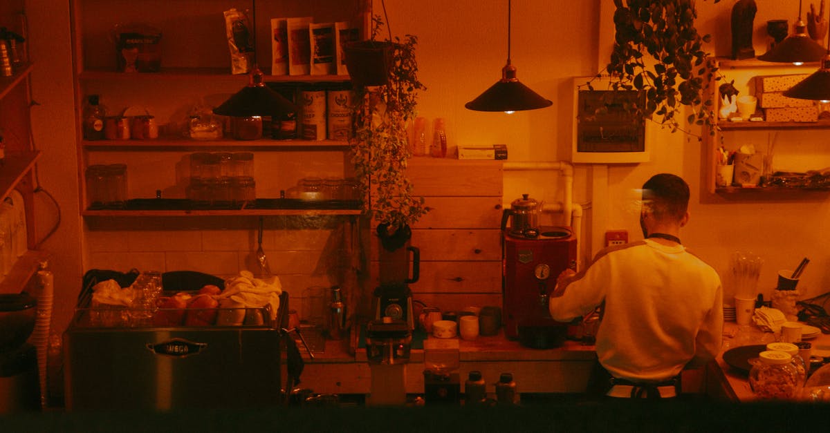 Commercial fridge for thawing - Man in White Shirt Standing in Kitchen