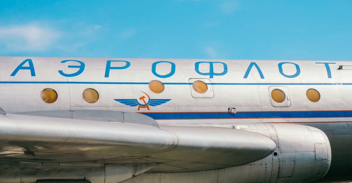 Commercial Kitchens in the UK - White and Blue Airplane Under Blue Sky