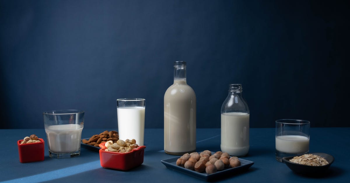 Condensed milk instead of evaporated [duplicate] - A Variety of Nuts and Milk on Glass Containers