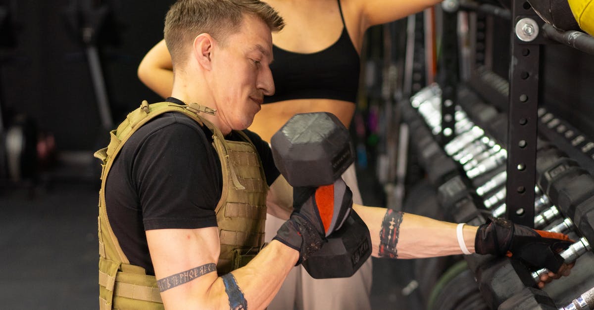 Consistently getting cannoli shells off their molds easily - Side View of a Man in a Weighted Vest Holding a Dumbbell