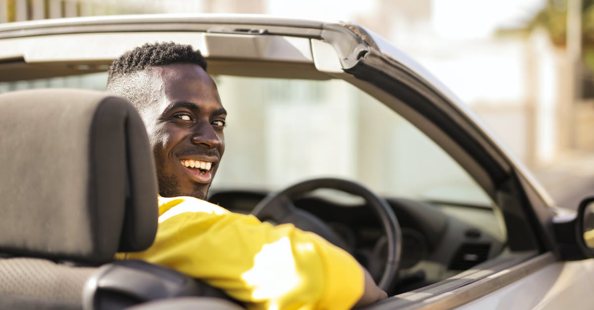 Converting a stovetop to a griddle - Man in Yellow Shirt Driving A White Luxury Car