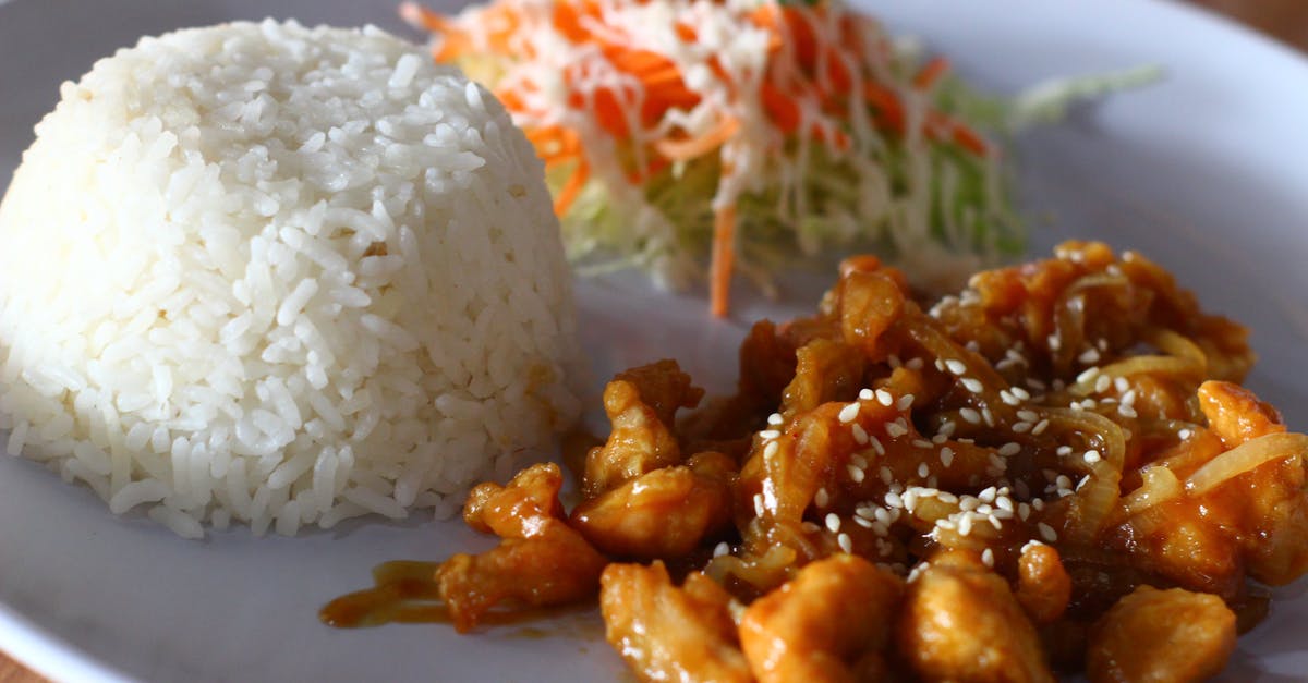 Cooked or caramalized onions in the refrigerator - A Cup of Rice with a Delicious Pork and Coleslaw on a Plate