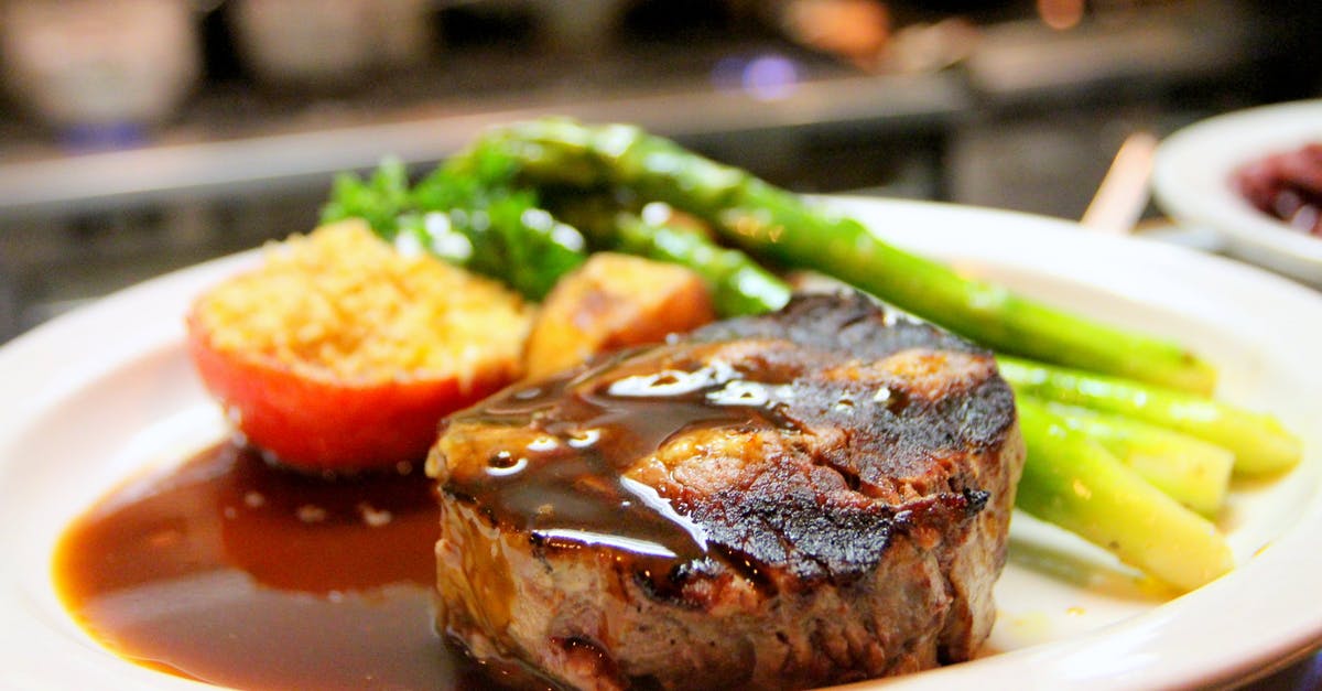 Cooking beef for pepper steak - Selective Focus Photography of Beef Steak With Sauce