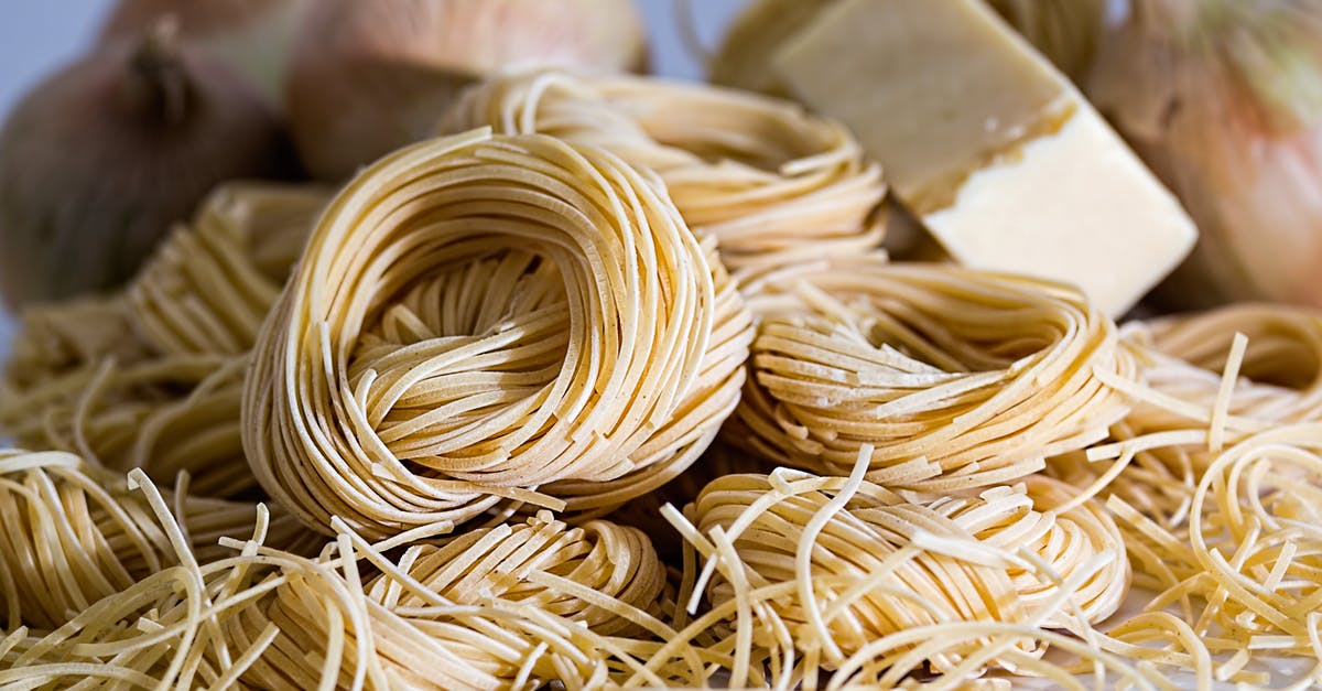 cooking fresh pasta [duplicate] - Yellow Pasta Beside Onions