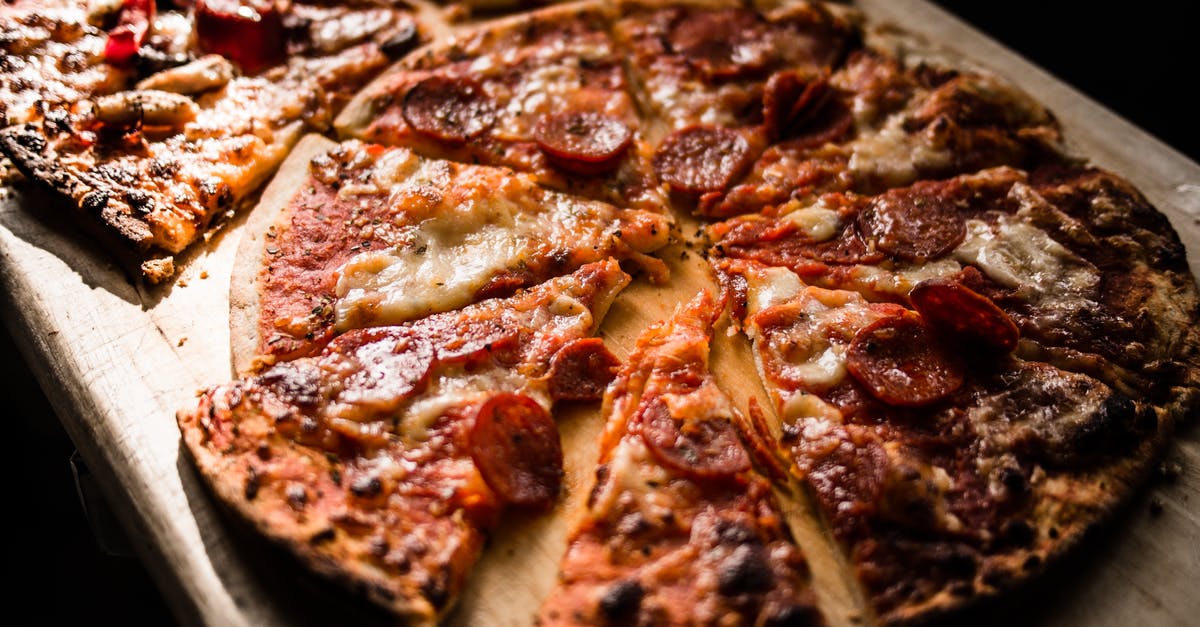 Cooking minced/ground beef with a jar of sauce - Pizza on Brown Wooden Board