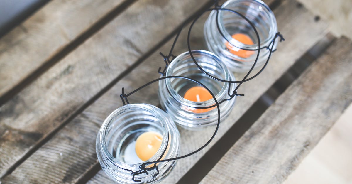 Cooking over an open flame at home - Three candleholders with tealights