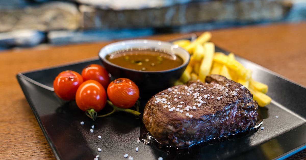 Cooking potatoes - baking covered in salt for mashing - Steak With French Fries and Red Fruits