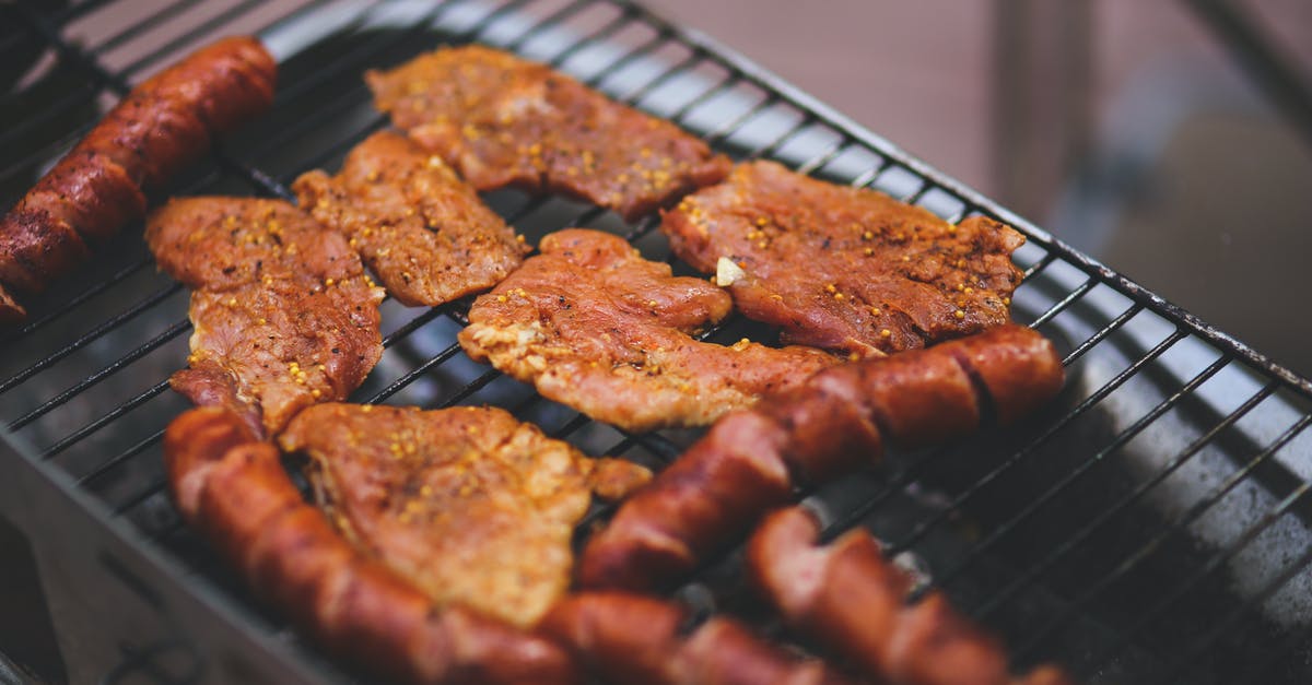 Cooking schnitzel without thinning it - Pork and sausage on the grill