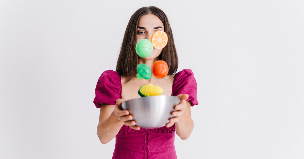 Cooking temperature chart - Woman in Purple Long Sleeve Shirt Holding White Ceramic Bowl With Candies