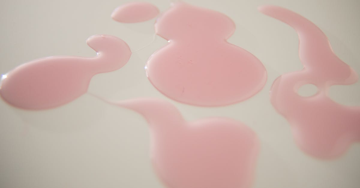 Cooking through thick liquids - Abstract backdrop of gel drops on white surface