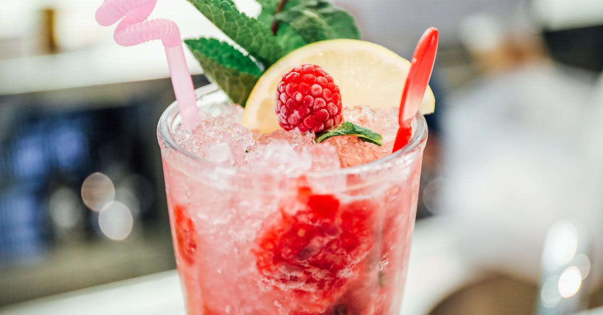 Cooling melted sugar quickly - Selective Focus Photography of Strawberry Juice