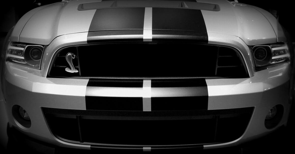 Cooling off a kettle-style grill - Grayscale Photo of Dodge Viper