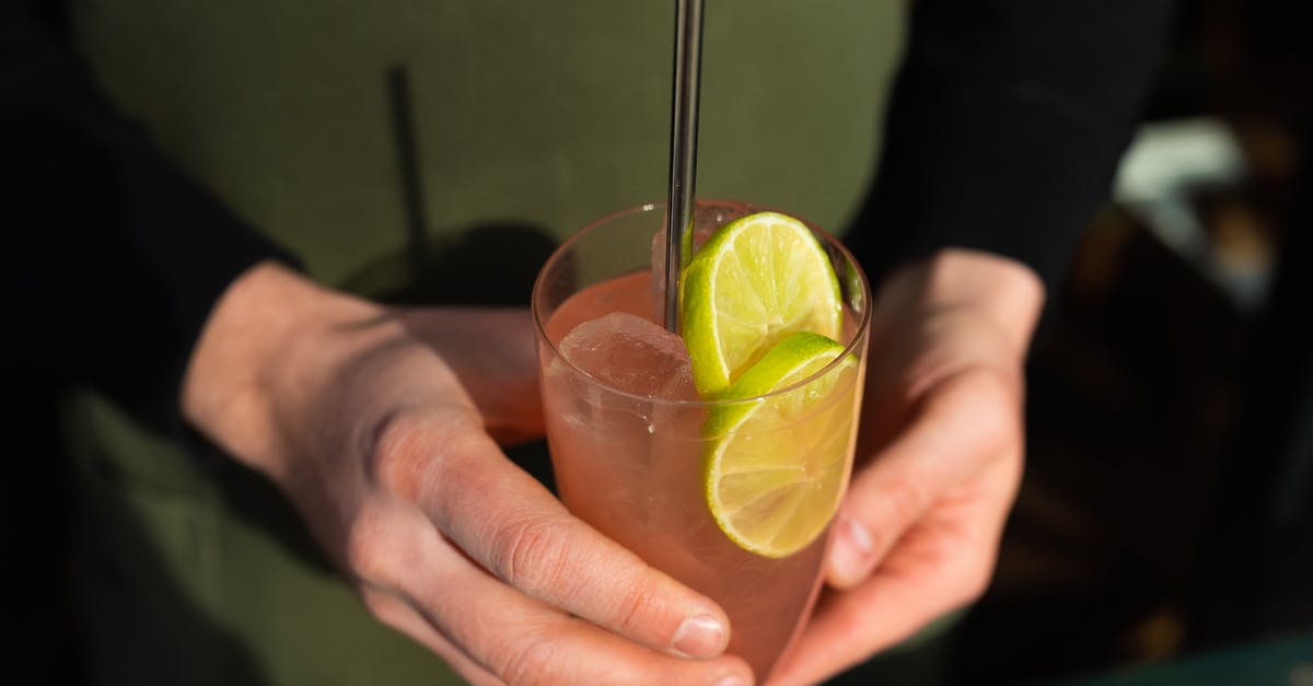 Copycat Lime Jello? - Person Holding Clear Drinking Glass With Orange Juice