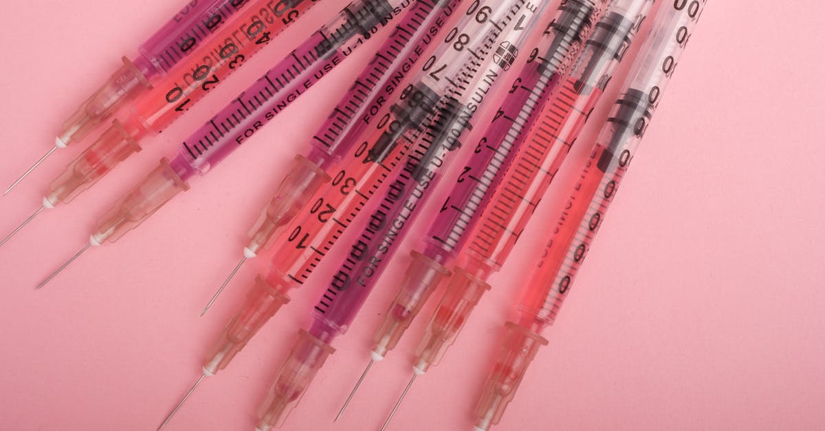 corned-beef cure/brine: viscous, snot-like substance - is this safe? - Set of syringes with liquid drug arranged on pink background