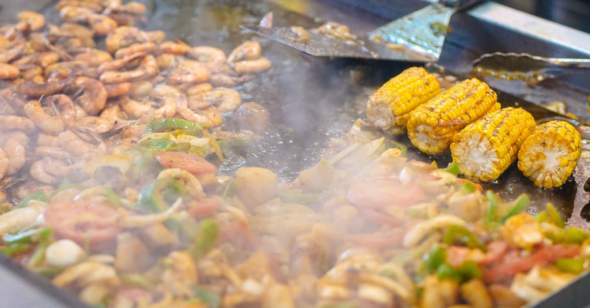 Corn/Potato/Rice/Flour starches in deep frying - Seafood and Corn Frying on Stainless Surface