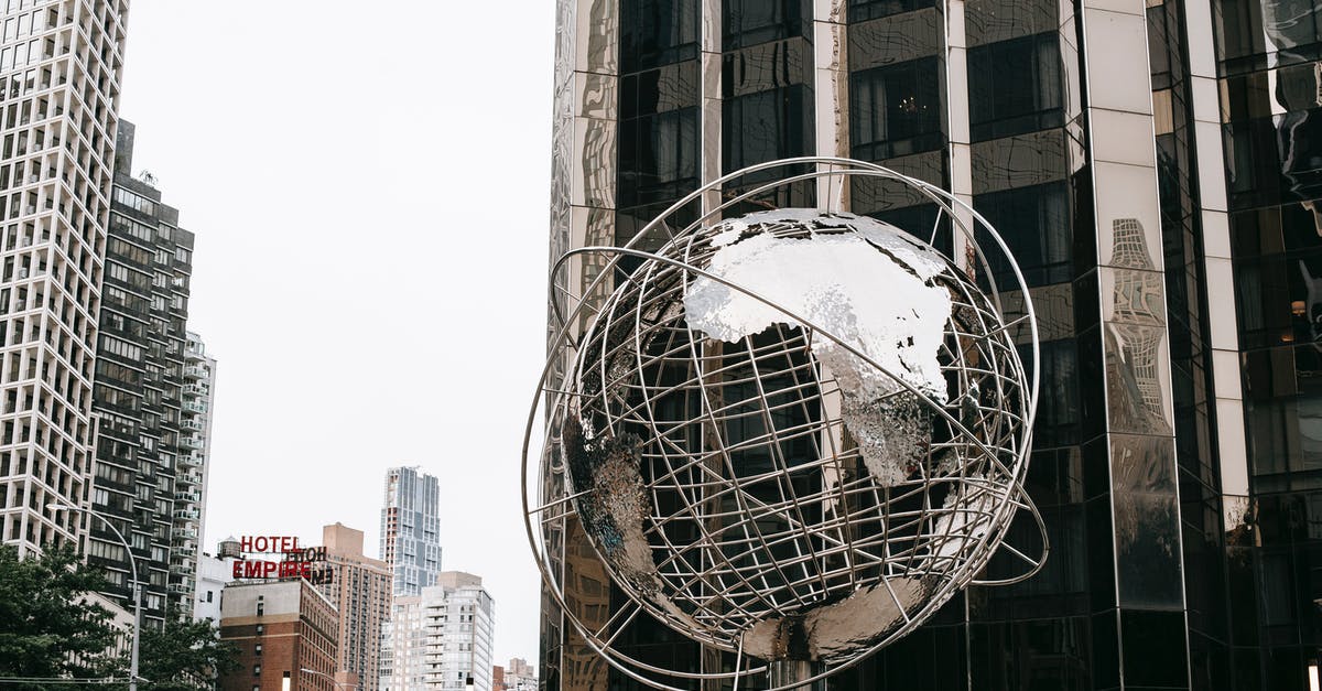 Cracks Developing in Straight-Sided Stainless Steel Vessels - Contemporary stainless steel unisphere sculpture located near modern skyscrapers against Trump tower on street in New York city on Manhattan