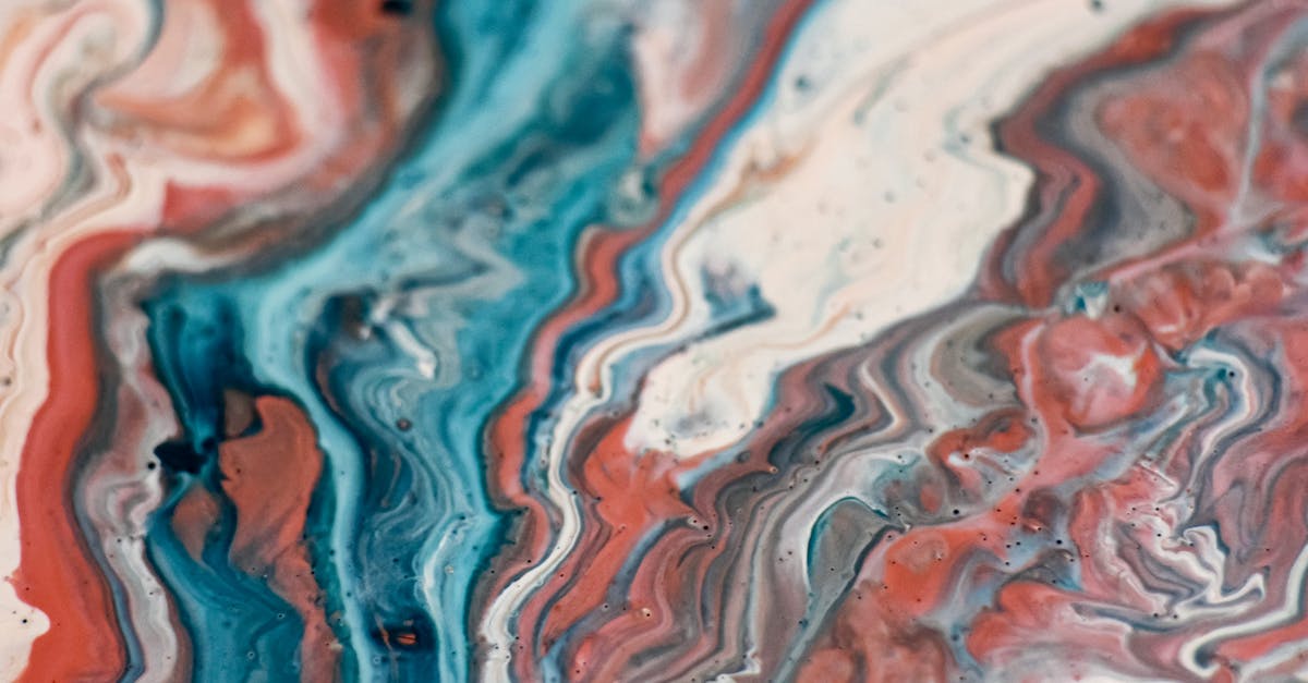 Creating differing temperature fluid gels that stay separate - Creative abstract background with vivid multicolored paints mixed together in technique of fluid art