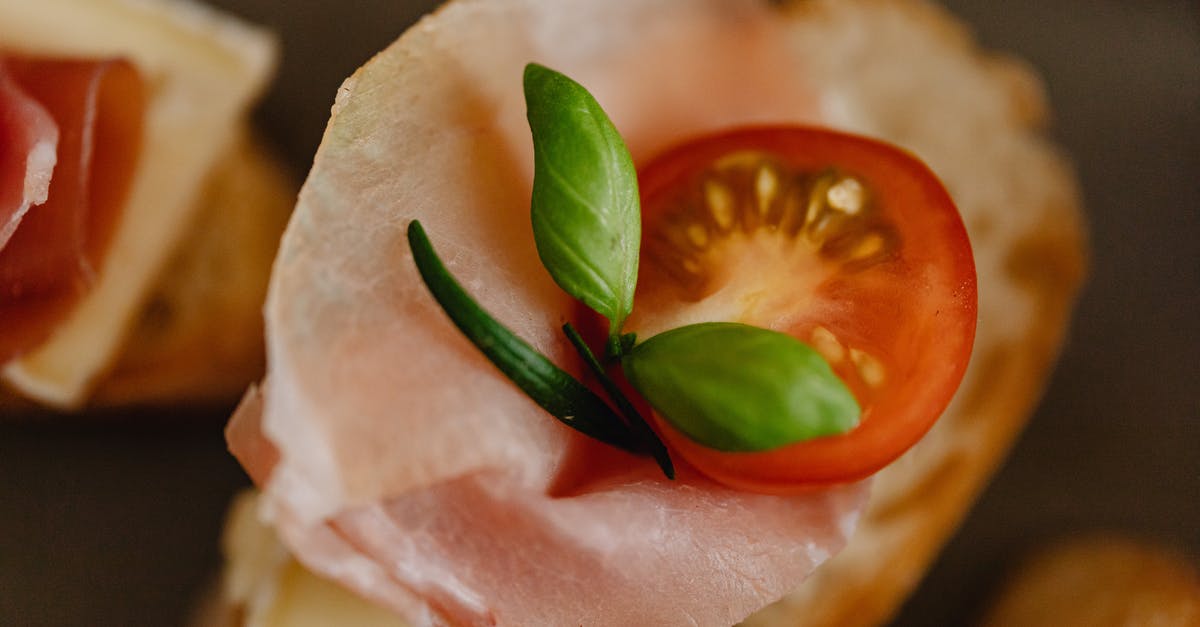 Crisping prosciutto - Close-up Shot of Prosciutto Ham on Bread