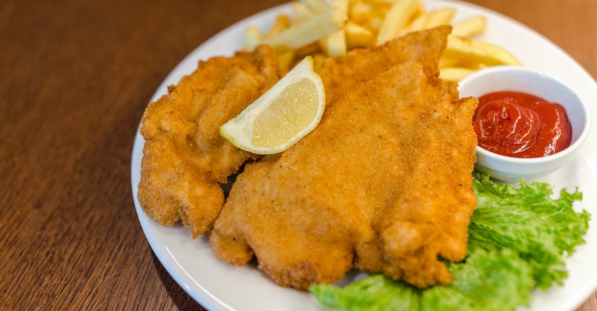 Crispy cold fried chicken - Fried Meat With Potato Fries and Ketchup Dip on Plate