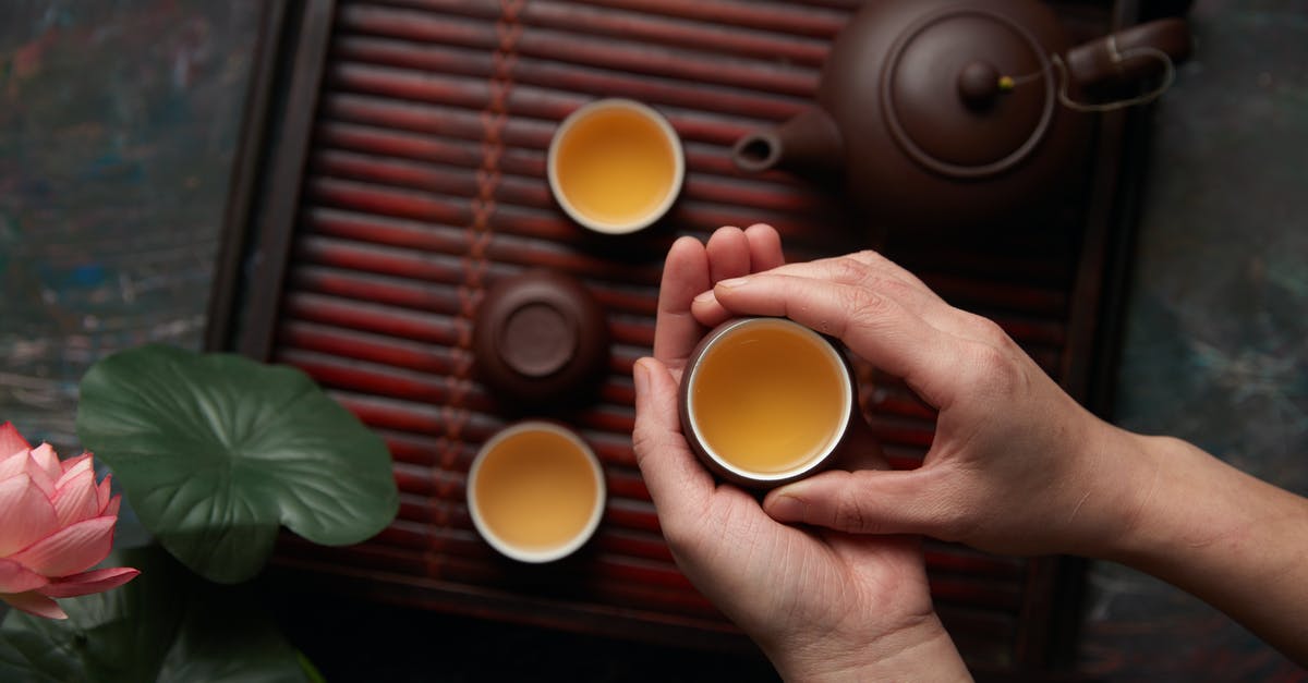 Crock pot turned to warm for 45mins- 1hr - Person Holding Tea Cup During Tea Ceremony