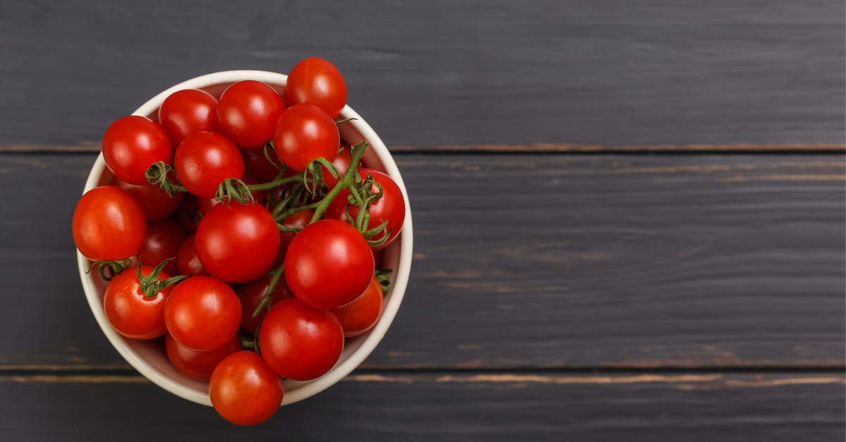 Crushed tomatoes - sub with diced or whole? - A Bowl of Fresh Red Tomatoes on a Wooden Table