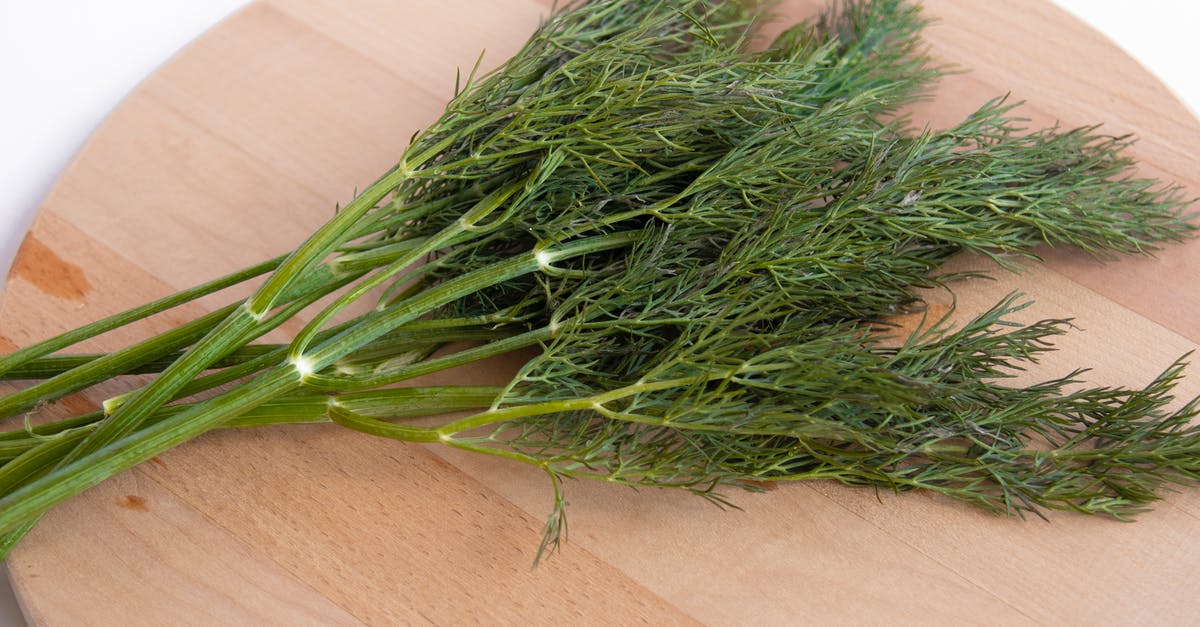 culinary difference between dill and fennel - Green Plant on Brown Wooden Table