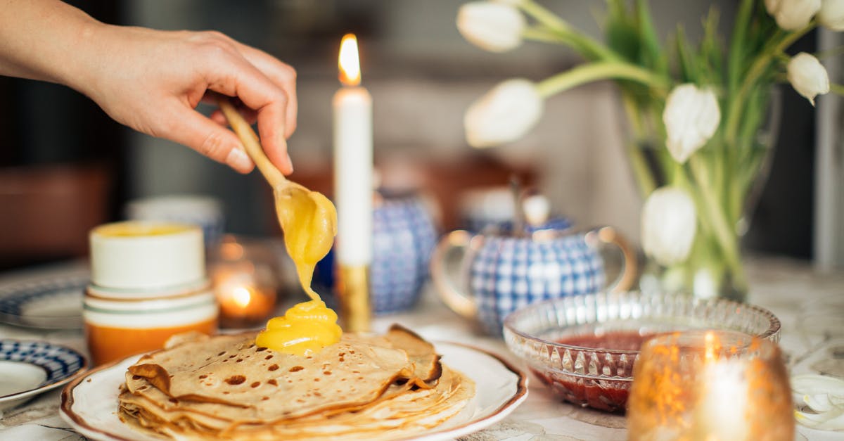 Custard curdling/splitting - Person Filling Crepe with Custard