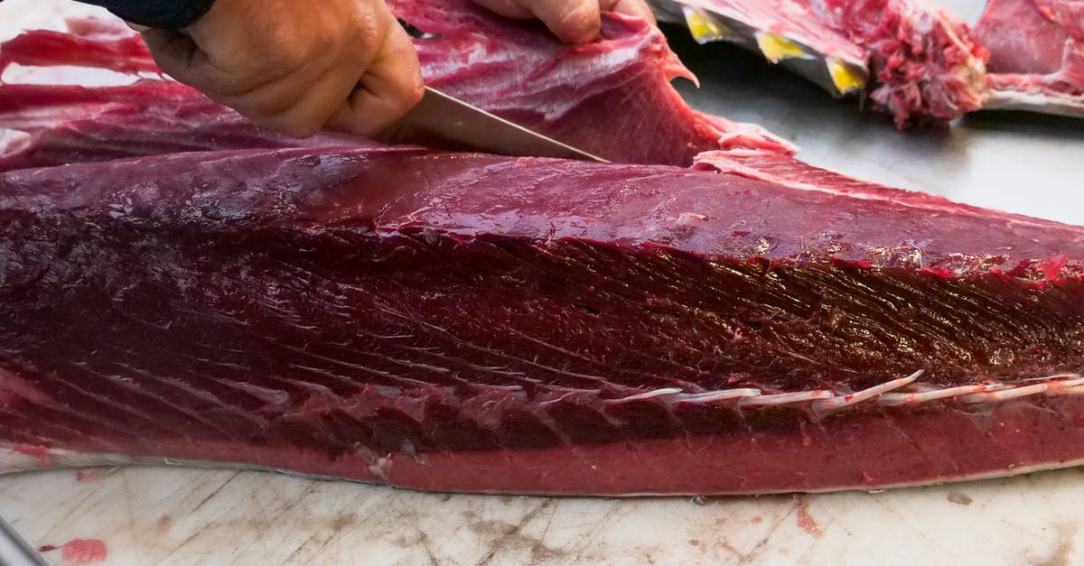 Cutting seared tuna - Slicing of Raw Tuna 