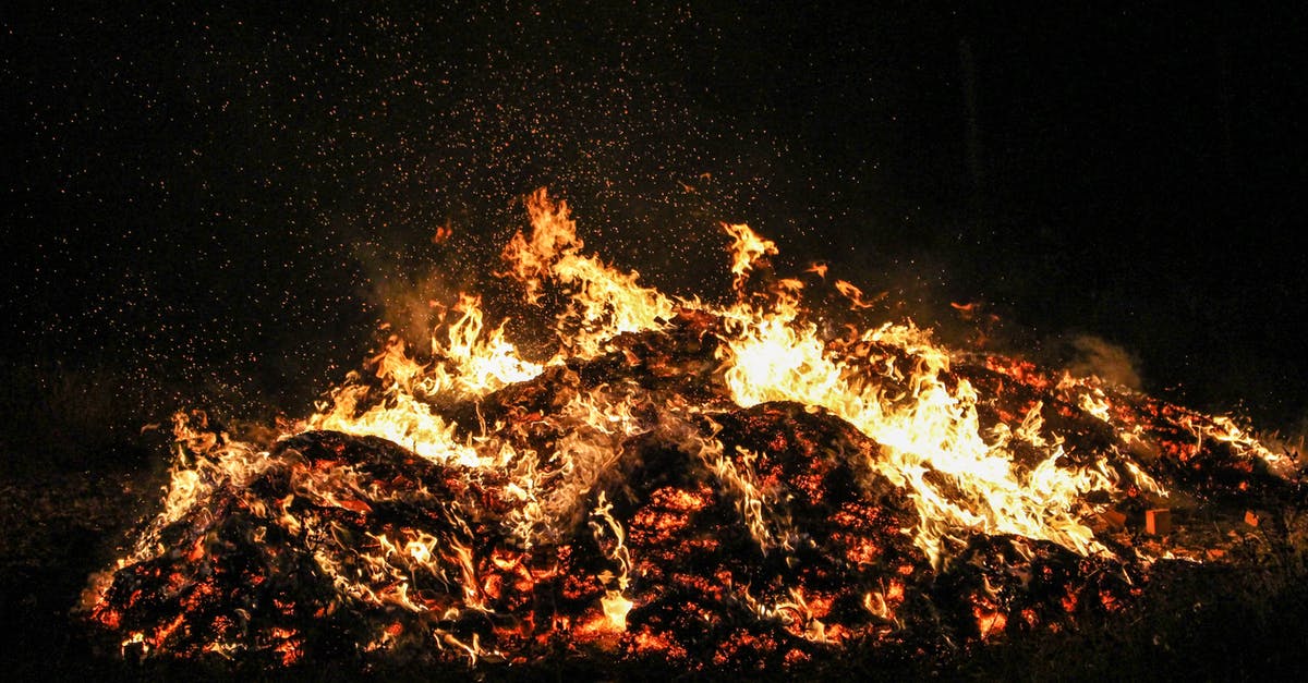 Dangers associated with sous-vide temperature and time - Burning bonfire with sparkles in darkness