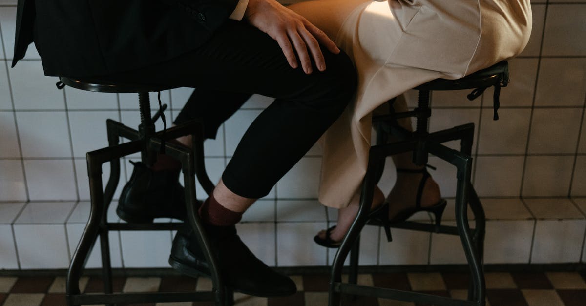 Date bars are too sticky - Person in Black Pants Sitting on White Chair