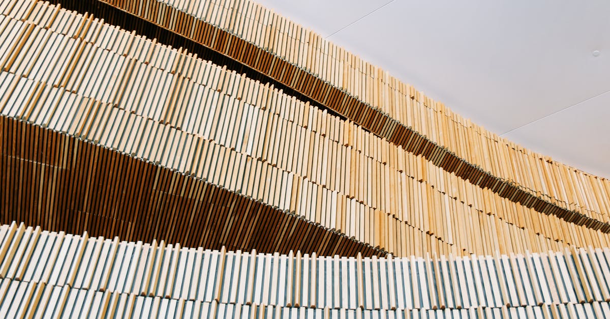 Deconstructed food; simple, complex or both? - From below of geometric minimalist wooden construction under white ceiling in modern building