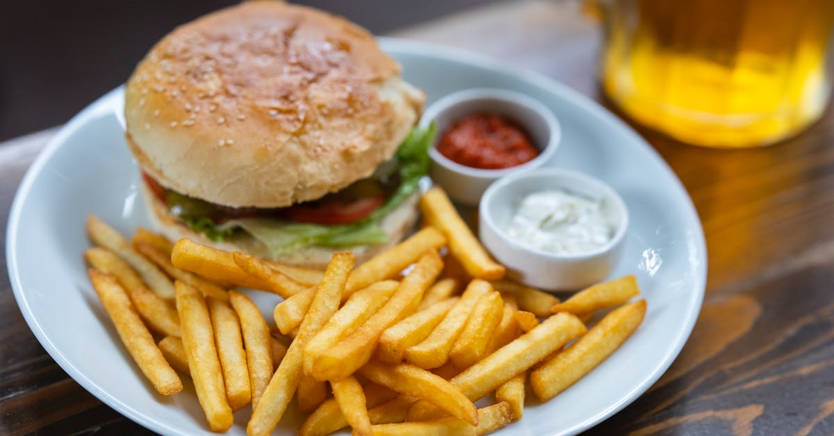 Deep frying - beer batter vs. bread crumbs - Burger and Potato Fries on Plate
