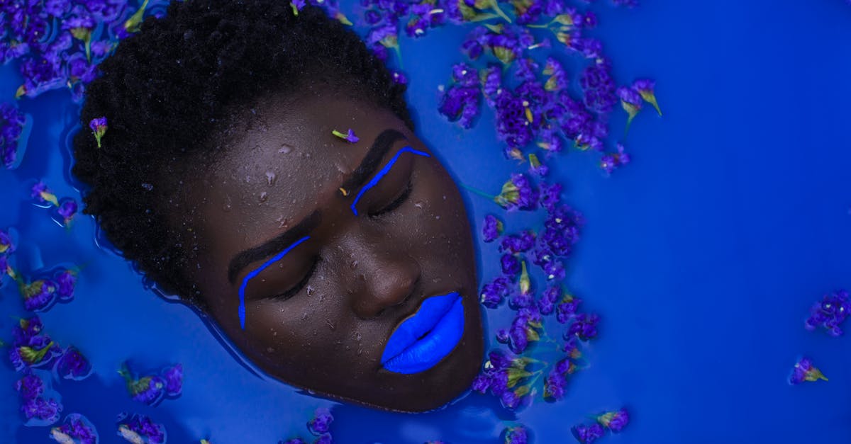 Deep frying and burning eyes - Woman With Blue Lips on Body of Water